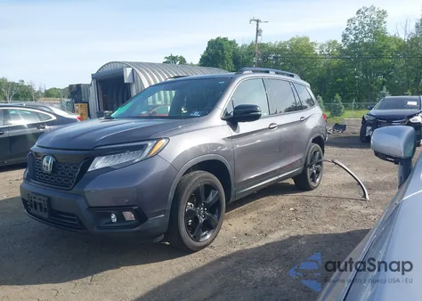 2019 Honda Passport Elite z USA, uszkodzony, nr VIN 5FNYF8H0XKB030776